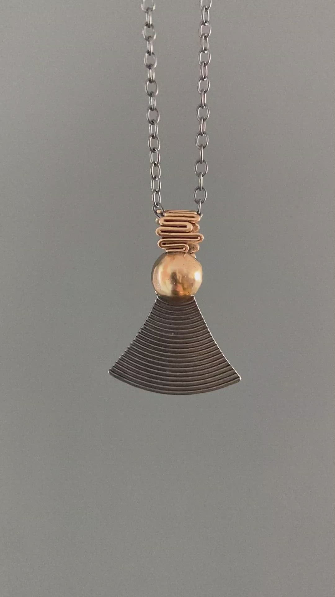 Bronze and Oxidized Silver Pendant