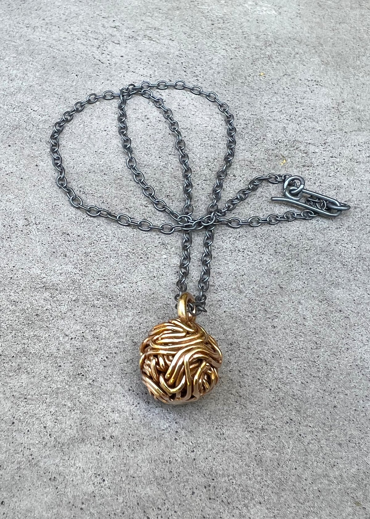 Metal Knot Pendant