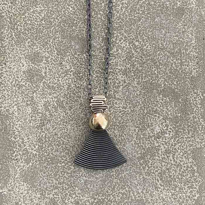 Bronze and Oxidized Silver Pendant